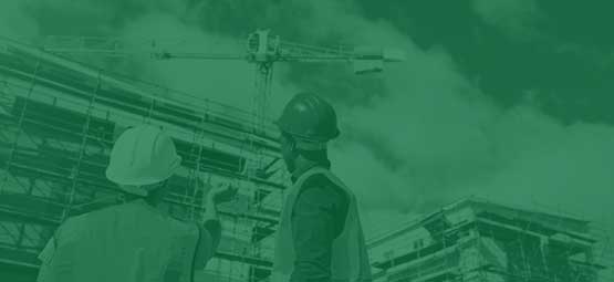 Consulting & Project Management: Two Wendit employees in front of the building shell