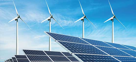Renewable Energy: Solar Panels and Wind Turbines Against a Blue Sky