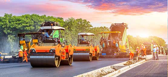 Infrastructure: Road rollers and paving machines in road construction in Africa