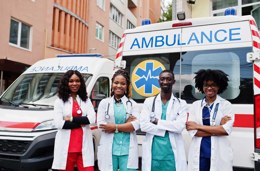 Four female paramedics in front of Wendit ambulances