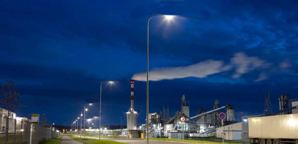 illuminated industrial site at night