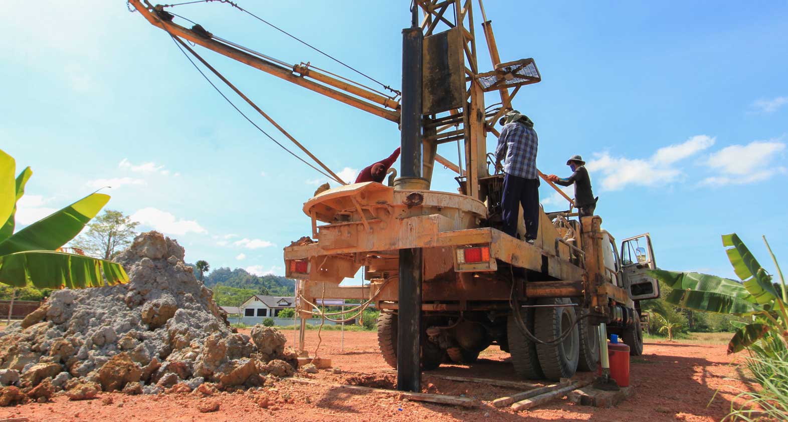 Well-drilling machine used in well construction in an African settlement